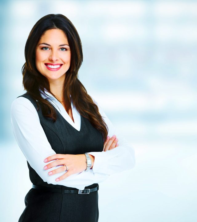Young,Bussiness,Woman,Standing,Over,Office,Background